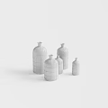 White Ceramic Vases Decorative Ornament Set With Layered Design And Various Sizes
