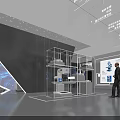 Hi Tech Exhibition Hall With Circular Interactive Screen And Display Stands Featuring Visitors 3d model