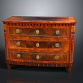 Vintage Wooden Cabinet With Three Drawers Brass Handles And Ornate Carved Details