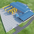 Industrial Factory Building With Blue Roof Yellow Storage Tanks Cranes And Green Grassy Area