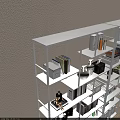 Modern Open White Shelving Unit With Books Decorative Items And Green Plants For Home Organization