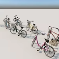 Various Stylish Bicycles in Different Colors Lined Up with Baskets and Classic Frames