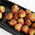 Fresh Ripe Pears Arranged on Two Black Ceramic Trays with Handles