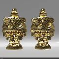 Two Golden Elegant Carving Decorative Sculptures With Symmetrical Ornate Patterns
