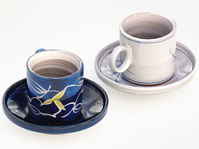 Two Ceramic Cups With Saucers Blue Cup Yellow White Patterns And White Cup Blue Trim 3d model