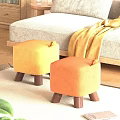 Cozy Living Room With Yellow And Orange Woven Fabric Stools With Wooden Legs