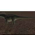 Green Dinosaur with Spiked Back Standing on Gravel Ground in Front of Glass Building Background