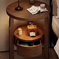 Elegant Black And White Bedside Table With Framed Picture Books And Lemon Bowl