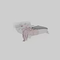 Modern Double Bed With Soft Pink And Gray Blankets And Decorative Pillows