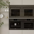 Modern Built in Kitchen Appliances with Double Ovens Microwave and Cabinetry Plus Green Plants