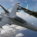 Two fighter jets flying in blue sky with white clouds and coastal ocean view below