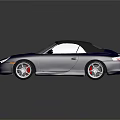 Dark blue sports car exterior with sleek two-door design and shiny silver wheels