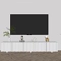 Modern White TV Stand With Flat Screen TV And Decorative Items In Living Room