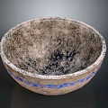 Antique Sculpture Carving Bowl With Grayish Black Surface Worn Edges And Blue Stripes Around Rim