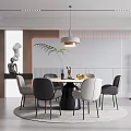 Modern Restaurant Interior With Round Dining Table Chairs Pendant Lighting And Plants