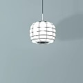 Modern White Round Pendant Light with Grid Design Hanging Against Light Blue Wall