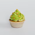 Colorful Cupcake With Green Frosting And Yellow Star Decorations On White Background