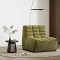 Green Velvet Modern Single Sofa With Small Round Table Green Plant And Wooden Floor