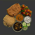 Delicious Indian Food Platter With Naan Bread Rice Curry Salad Yogurt Dip And Cucumber Slices