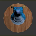 Blue Dragon Head Mounted On Wooden Circular Base With Yellow Horns And Colorful Spots