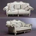 Elegant Cream Colored Sectional Sofa With Carved Details And Decorative Pillows