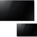 Two Modern Ultra Slim Smart TVs With Black Screens And Wall Mount Design