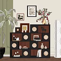 Modern Entryway Cabinet Sideboard with Circular Decor Books Vases and Green Plants