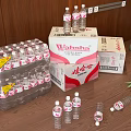 Wahaha Mineral Water Bottles And Stacked Cartons On Wooden Table