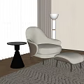 Modern Single Sofa With Ottoman Small Side Table And Floor Lamp In Living Room
