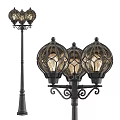 Vintage Outdoor Lights With Decorative Lamp Posts And Multiple Transparent Shades