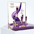New AHC Cosmetic Skincare Collection With Purple Bottles On Display Stand