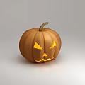 Decorative Ornament Set featuring carved pumpkin lantern with glowing face for Halloween decoration