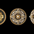 Three Weapon Decorative Circular Ornaments With Gold Silver Patterns And Gemstone Centers 3d model