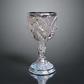 Exquisite Silver Goblet With Intricate Carved Designs And Ornate Base As Home Living Accessory