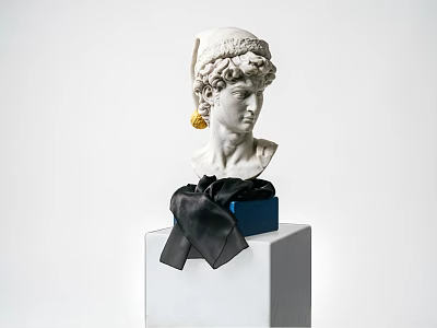 Decorative Ornament Set With White Sculpted Head Blue Box Black Ribbon On White Cube Base 3d model