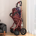 Red Frame Rollator Walker With Floral Seat And Storage Baskets In Indoor Setting 3d model