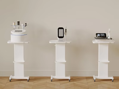 Three Professional Medical Devices On White Wheeled Stands With Light Walls And Wooden Floor 3d model