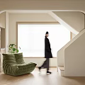 Modern Luxury Open Concept Living Dining Room With Beige Sofa Round Coffee Table And Greenery