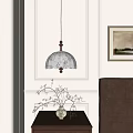 Floral Pattern Pendant Light With Wooden Base Hanging In Paneled Wall Room With Decorative Plant