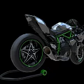 Modern Black And Green Sporty Motorcycle With Sleek Streamlined Design And Transparent Windscreen