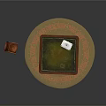 Square Wooden Coffee Table On Round Rug With Brown Leather Chair And Books