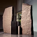 Large Stone Blocks With Black And Light Wooden Blocks In Indoor Display Space With Window