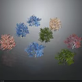 Various Colored Trees in Blue Pink Orange Green Purple on Dark Background