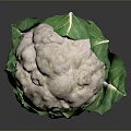 Natural Organic Fresh Cauliflower With Green Leaves On Dark Surface