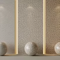 Textured Stone Wall Surfaces With Wooden Accents And Three Decorative Stone Spheres