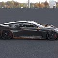 Black Luxury Sports Car With Gold Accents And Sleek Aerodynamic Design
