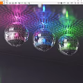 Sparkling Mirror Ball Chandeliers with Vibrant Colorful Light Beams for Party Decoration