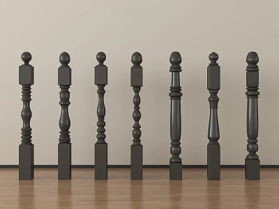 Black Wooden Railing Balusters with Various Intricate Designs Arranged on Wooden Floor Against Light Wall 3d model