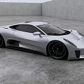Sleek Silver Jaguar Sports Car In Modern Studio With Gray Floor And White Ceiling