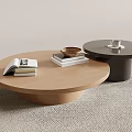 Two Round Coffee Tables Light Wooden And Black With Books Magazine Cup And Tray